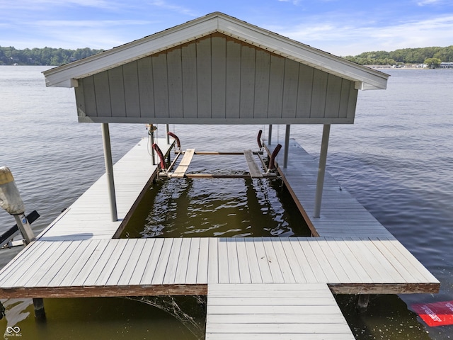 5823 E Sheridan Rd, Monticello, IN 47960 - dock area featuring boat lift and a water view