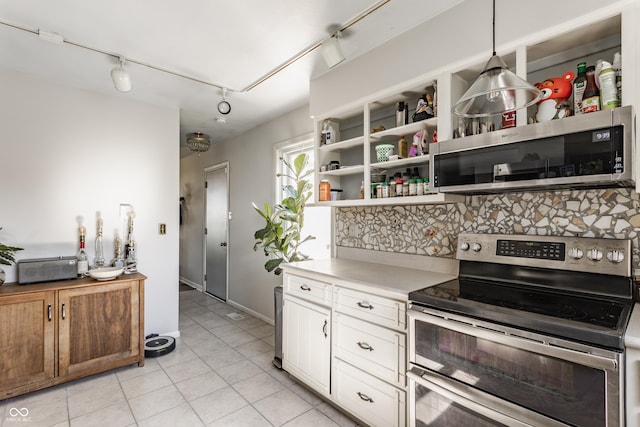 48 Wilson Dr, Carmel, IN 46032 - kitchen with appliances with stainless steel finishes, tasteful backsplash, light countertops, open shelves, and light tile patterned floors