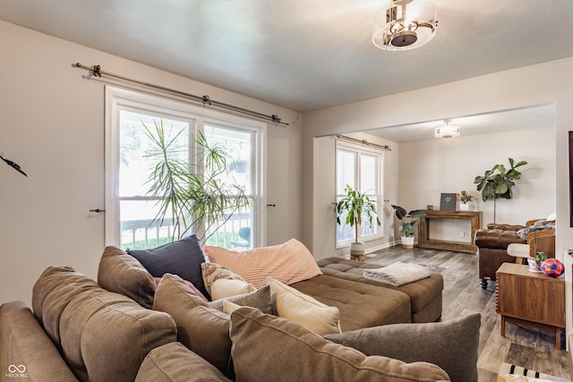 48 Wilson Dr, Carmel, IN 46032 - living area featuring plenty of natural light and wood finished floors