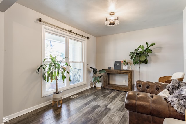 48 Wilson Dr, Carmel, IN 46032 - sitting room with baseboards and wood finished floors