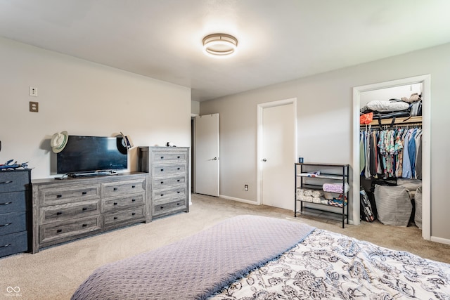 48 Wilson Dr, Carmel, IN 46032 - carpeted bedroom featuring a walk in closet and a closet