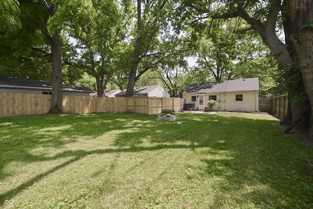 5636 Crittenden Ave, Indianapolis, IN 46220 - fenced backyard featuring a patio area