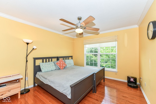 14109 Secretariat Ct, Carmel, IN 46074 - bedroom with crown molding, light wood finished floors, and a ceiling fan