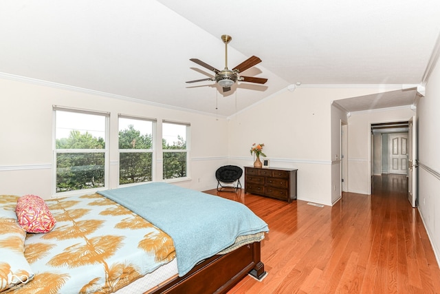 14109 Secretariat Ct, Carmel, IN 46074 - bedroom with ornamental molding, lofted ceiling, wood finished floors, and ceiling fan