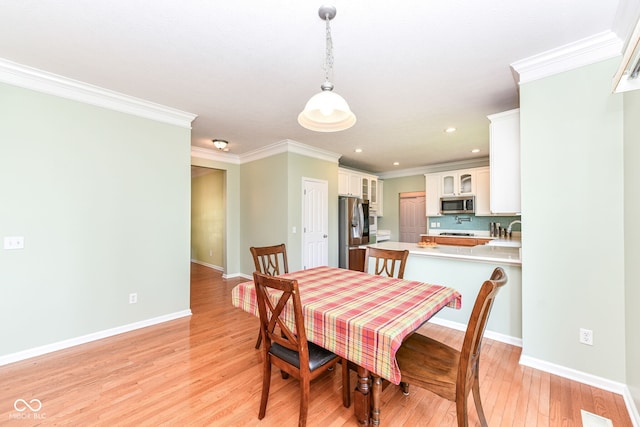 14109 Secretariat Ct, Carmel, IN 46074 - dining space with ornamental molding, light wood-type flooring, and recessed lighting