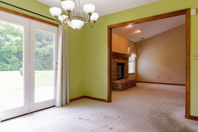 413 Blue Spring Dr, Indianapolis, IN 46239 - unfurnished living room with carpet floors, a chandelier, a fireplace, and lofted ceiling
