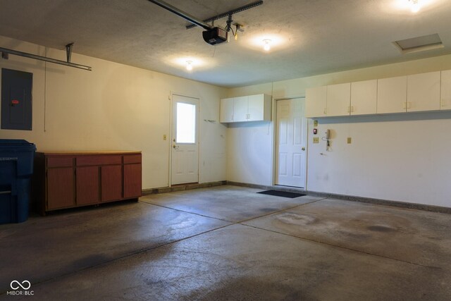 413 Blue Spring Dr, Indianapolis, IN 46239 - garage featuring electric panel and a garage door opener