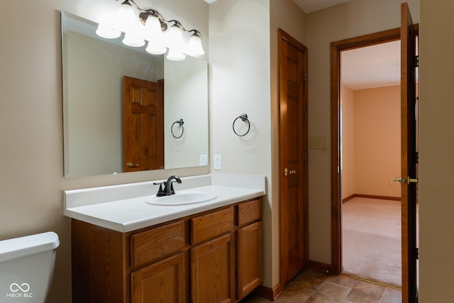 413 Blue Spring Dr, Indianapolis, IN 46239 - bathroom featuring toilet and vanity