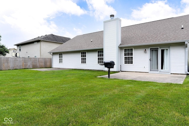 413 Blue Spring Dr, Indianapolis, IN 46239 - rear view of property featuring a patio, a chimney, and roof with shingles