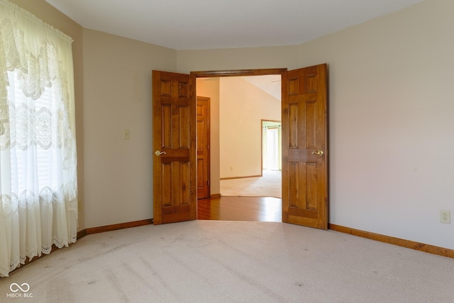 413 Blue Spring Dr, Indianapolis, IN 46239 - spare room with carpet floors and baseboards