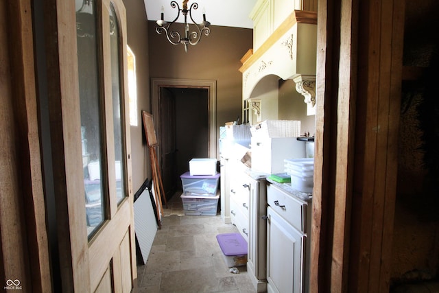 2825 E 216th St, Cicero, IN 46034 - bathroom with stone finish floors, vanity, and a chandelier