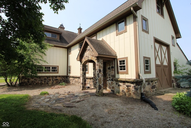 2825 E 216th St, Cicero, IN 46034 - view of front of house featuring stone siding and roof with shingles