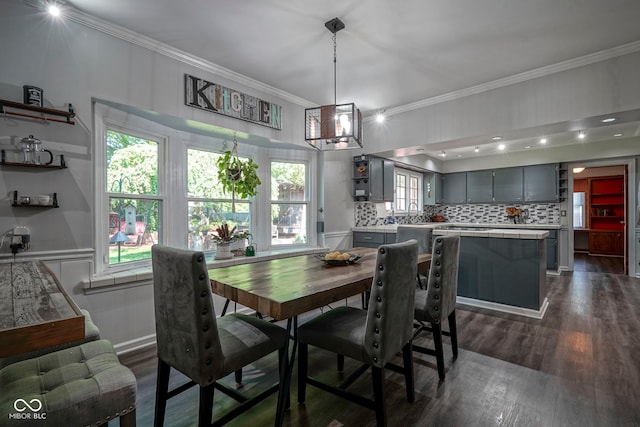 9420 N Kenwood Ave, Indianapolis, IN 46260 - dining area with ornamental molding and dark wood-style floors