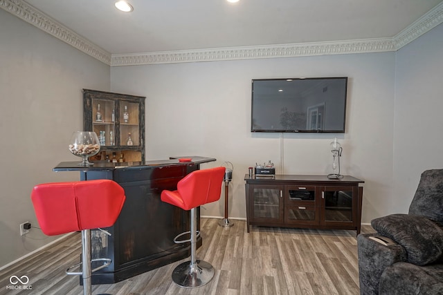 9420 N Kenwood Ave, Indianapolis, IN 46260 - indoor dry bar with wood finished floors, recessed lighting, and crown molding