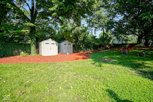 9420 N Kenwood Ave, Indianapolis, IN 46260 - view of grassy yard with a storage unit