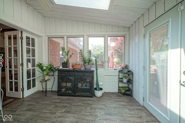 9420 N Kenwood Ave, Indianapolis, IN 46260 - sunroom featuring lofted ceiling, a skylight, french doors, and wood finished floors
