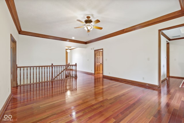5274 Brooks Bnd, Greenwood, IN 46143 - empty room with ornamental molding, a ceiling fan, and wood finished floors