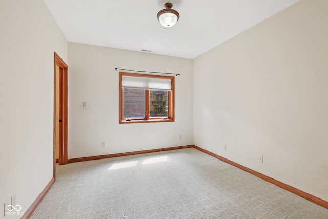 5274 Brooks Bnd, Greenwood, IN 46143 - spare room featuring light carpet and baseboards