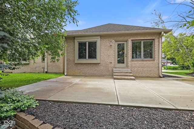 5274 Brooks Bnd, Greenwood, IN 46143 - back of property with entry steps, brick siding, a patio, and roof with shingles