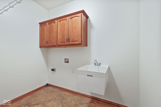 5274 Brooks Bnd, Greenwood, IN 46143 - laundry area with hookup for a washing machine, cabinet space, and stone finish floors