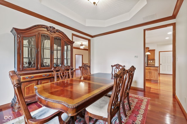 5274 Brooks Bnd, Greenwood, IN 46143 - dining area featuring hardwood / wood-style flooring and a raised ceiling