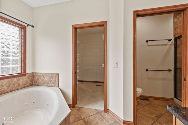 5274 Brooks Bnd, Greenwood, IN 46143 - full bath featuring healthy amount of natural light and a whirlpool tub
