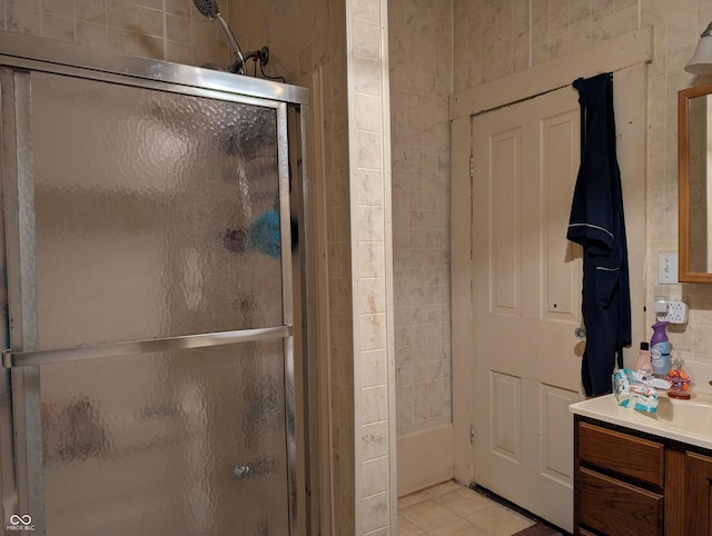 180 N Pike St, Vernon, IN 47282 - bathroom featuring vanity, tile patterned flooring, and combined bath / shower with glass door