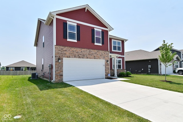 1351 Byron St, Greenfield, IN 46140 - view of front of house featuring stone siding, an attached garage, and concrete driveway