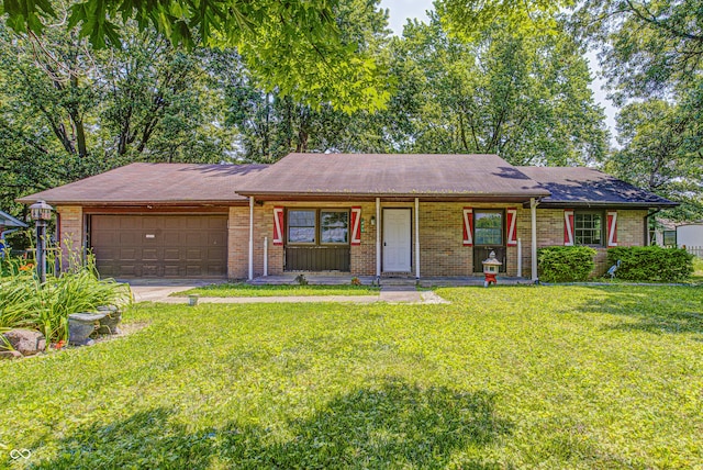 436 N 500 W, Anderson, IN 46011 - ranch-style house featuring an attached garage, a front yard, brick siding, and roof with shingles