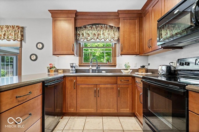 54 Horseshoe Ln, Carmel, IN 46033 - kitchen featuring black appliances and brown cabinetry