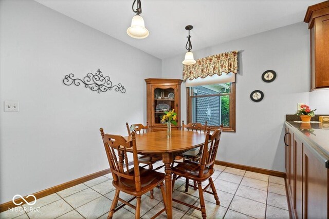 54 Horseshoe Ln, Carmel, IN 46033 - dining room featuring baseboards and light tile patterned floors