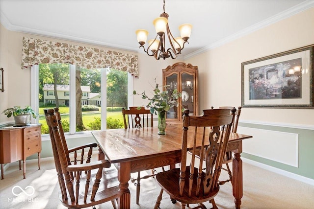 54 Horseshoe Ln, Carmel, IN 46033 - dining room featuring light colored carpet, a chandelier, and crown molding