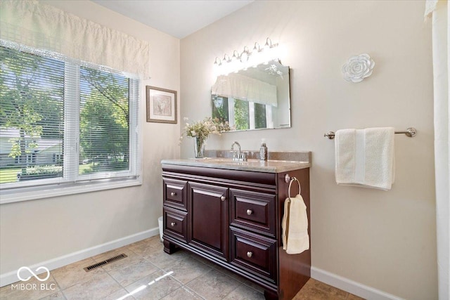 54 Horseshoe Ln, Carmel, IN 46033 - bathroom with baseboards and vanity