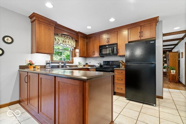 54 Horseshoe Ln, Carmel, IN 46033 - kitchen featuring black appliances, a peninsula, dark countertops, brown cabinets, and recessed lighting