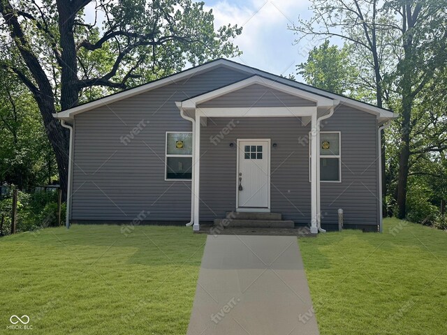 2127 Haines Ave, Indianapolis, IN 46221 - view of front of house featuring entry steps and a front yard
