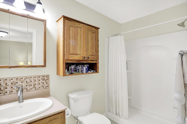 8038 Sydney Ln, Avon, IN 46123 - bathroom featuring a shower with shower curtain, vanity, and backsplash