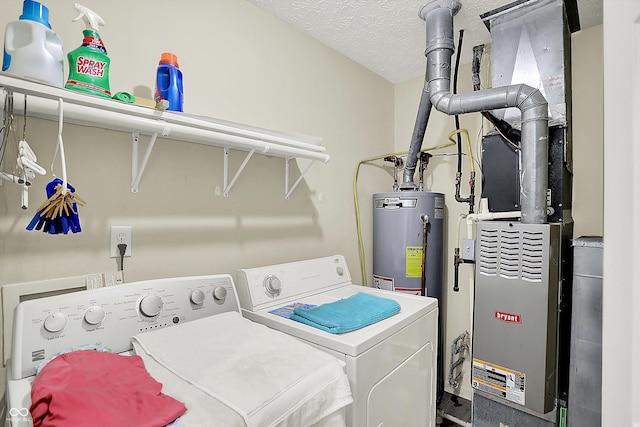8038 Sydney Ln, Avon, IN 46123 - washroom featuring washing machine and dryer, heating unit, water heater, and a textured ceiling