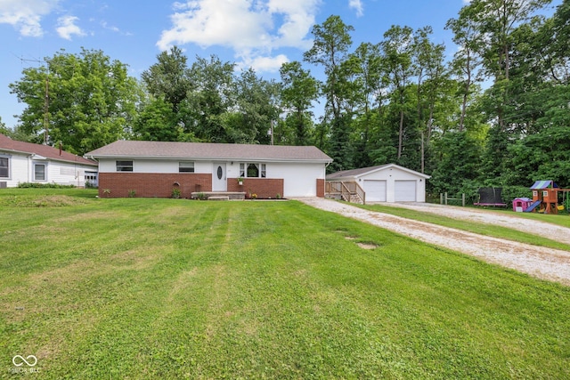 405 W Jacob St, Greencastle, IN 46135 - ranch-style home with a garage, brick siding, a front lawn, an outdoor structure, and a playground