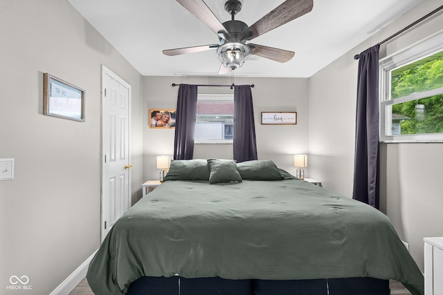 405 W Jacob St, Greencastle, IN 46135 - bedroom featuring multiple windows and ceiling fan