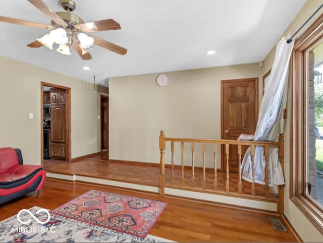 8217 S Talbott Ave, Indianapolis, IN 46227 - sitting room with wood finished floors, ceiling fan, and recessed lighting
