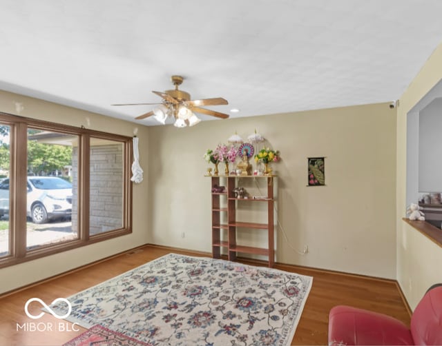 8217 S Talbott Ave, Indianapolis, IN 46227 - living room with ceiling fan and wood finished floors
