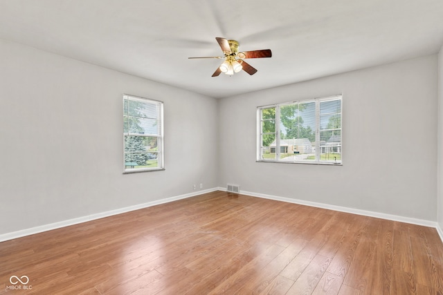 1020 N Ritter Ave, Indianapolis, IN 46219 - empty room featuring healthy amount of natural light, ceiling fan, and wood finished floors