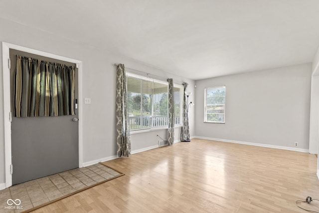 1020 N Ritter Ave, Indianapolis, IN 46219 - empty room featuring wood finished floors and baseboards