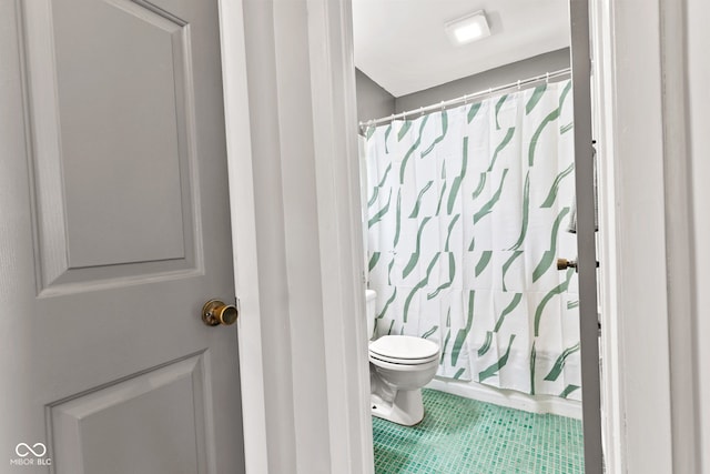 1020 N Ritter Ave, Indianapolis, IN 46219 - bathroom with curtained shower and tile patterned flooring