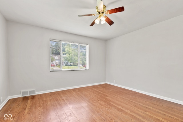 1020 N Ritter Ave, Indianapolis, IN 46219 - empty room featuring light wood finished floors and a ceiling fan