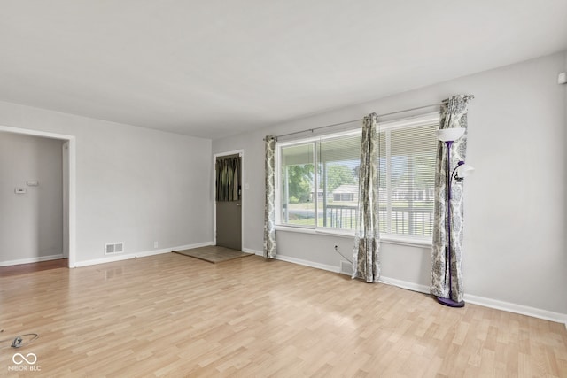 1020 N Ritter Ave, Indianapolis, IN 46219 - spare room featuring light wood-type flooring and baseboards