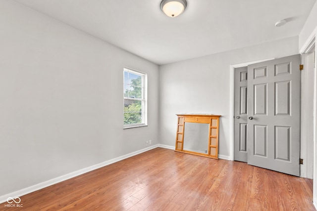 1020 N Ritter Ave, Indianapolis, IN 46219 - unfurnished bedroom with light wood-style flooring