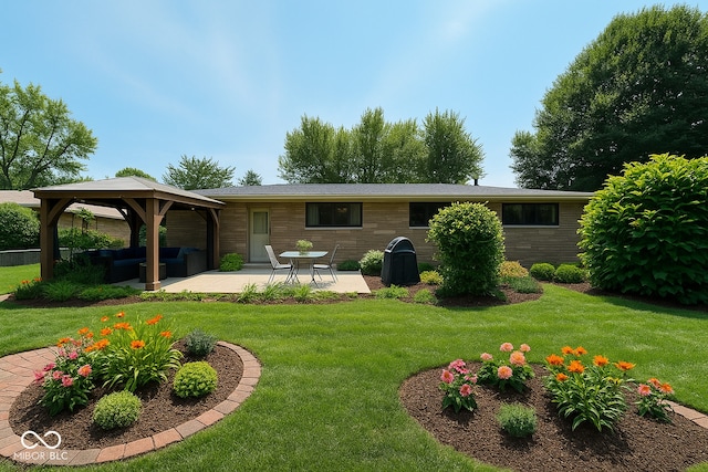 7150 Combs Rd, Indianapolis, IN 46237 - back of house with a gazebo, a patio area, and a lawn