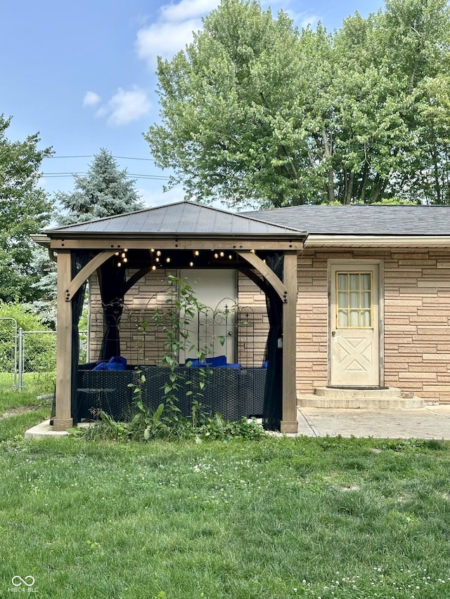7150 Combs Rd, Indianapolis, IN 46237 - view of side of property with a gazebo and brick siding