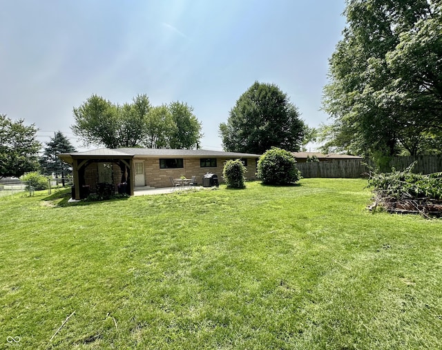 7150 Combs Rd, Indianapolis, IN 46237 - view of yard with a patio